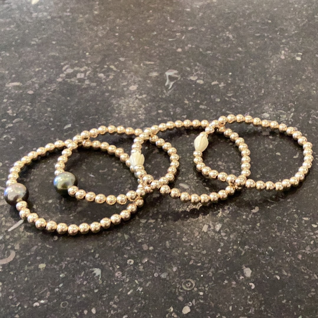 Gold 5 mm beaded bracelets with pikake and pearl accents
